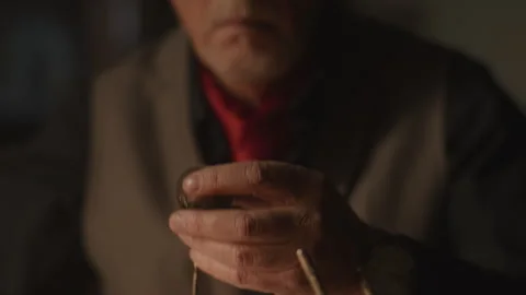 Watchmaker checking a skull pocket watch Stock-Footage 258299575