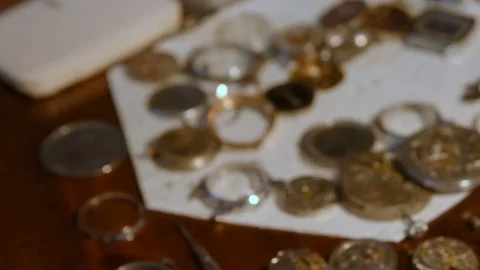 Watchmaker repairing clockwork Stock Footage 72746563