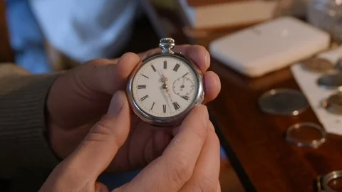 Watchmaker repairing clockwork Stock Footage 79603735