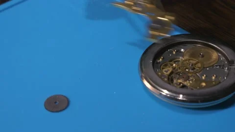 The watchmaker is repairing an old watch. Insert details. Close-up. Video stock 139061535