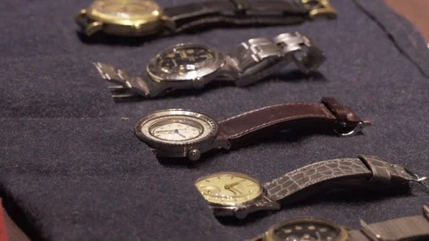A Watchmaker shows off his private collection of antique watches Stock Footage 114432872