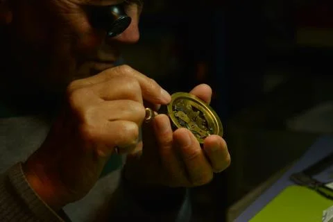 Watchmaker working Stock Photos