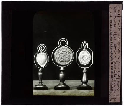 Watchmaking. Showcase objects. Watches. Silverware. Three watches Watchmak... Stock Photos