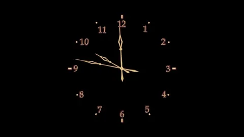 The watch's dial is black with gold hands neon Arabic numerals 10 o'clock g.. Stock Footage 346725513