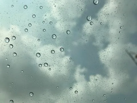 Wate drop with cloud as background Stock Photos