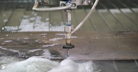 Water-abrasive CNC machine for cutting metal on water table Stock Footage 183190521