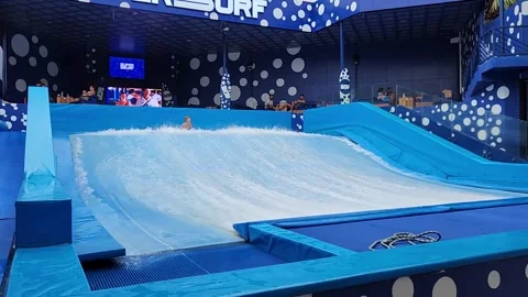 Water activities, surfing on artificial waves Stockbeeldmateriaal 252509481