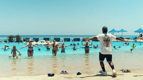 Water aerobics classes in the Gravity Aqua park Hotel pool. Stock Footage 341274206