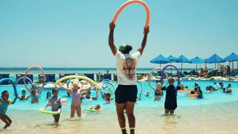 Water aerobics classes in the Gravity Aqua park Hotel pool. 库存影片 341274268