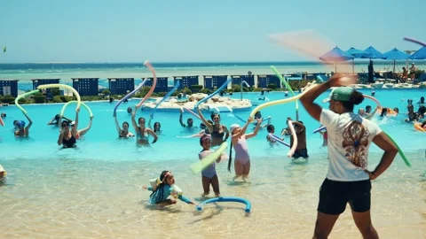 Water aerobics classes in the Gravity Aqua park Hotel pool. 库存影片 341274270