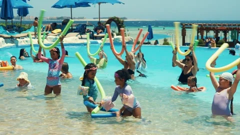 Water aerobics classes in the Gravity Aqua park Hotel pool. 库存影片 341274290
