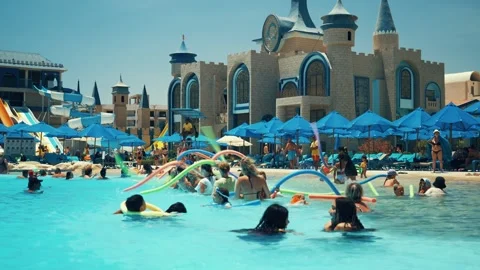 Water aerobics classes in the Gravity Aqua park Hotel pool. Stock Footage 341274306