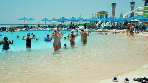 Water aerobics classes in the Gravity Aqua park Hotel pool. Stock Footage 341274336