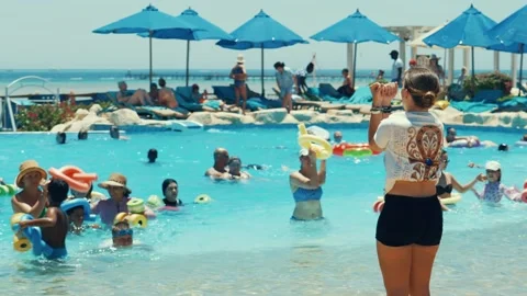 Water aerobics classes in the Gravity Aqua park Hotel pool. Stock Footage 341274530