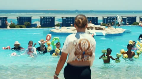 Water aerobics classes in the Gravity Aqua park Hotel pool. Stock Footage 341274588