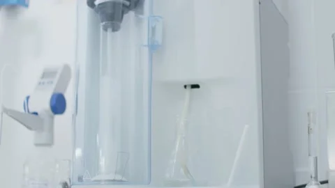 Water Analysis In Machine At Laboratory. Science and Technology Close Up Stock Footage 173169442