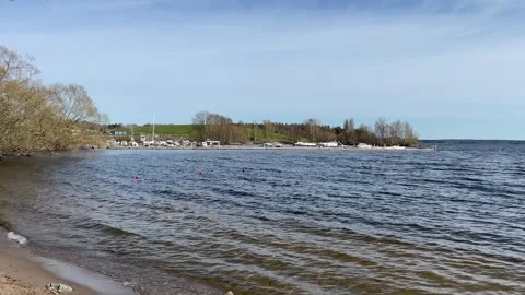 Water and beach during spring time. Stock Footage 250657901