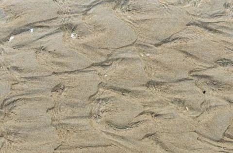 Water and sand pattern Stock Photos