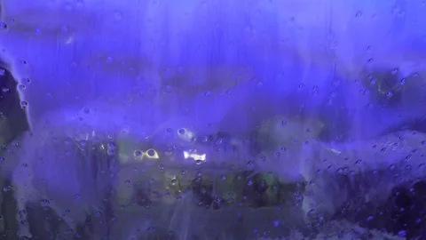 Water and soap bubbles and foam at car wash Stock Footage