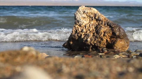 Water and Tide Lapping against the Shore in Lake Mohave Stock Footage