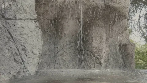 Water in artifical waterfall going down Stock Footage 83700301