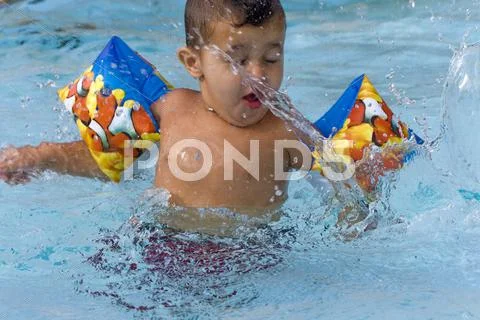 Water baby with water wings Stock Photos