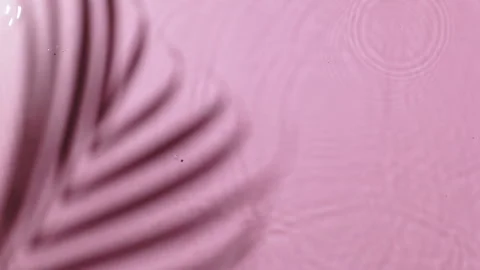 Water background. Pink aqua texture, surface of ripples, rings, transparent Stock Footage 168679419