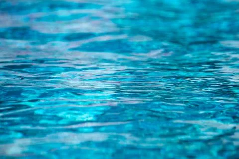 Water background, ripple waves. Blue swiming pool pattern. Sea surface. Water in Stock Photos