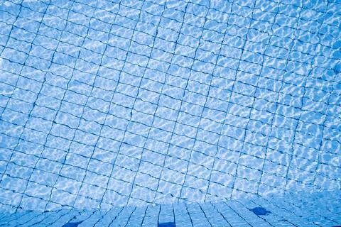 Water background texture. Blue wave pool surface. Summer sea abstract pattern 스톡 사진