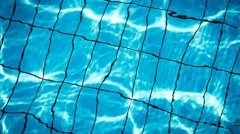 Water background texture. Blue wave pool surface. Summer sea abstract pattern Stock Photos