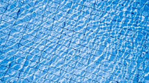 Water background texture. Blue wave pool surface. Summer sea abstract pattern 스톡 사진