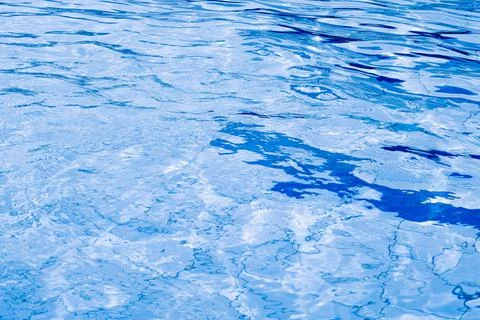 Water background texture. Blue wave pool surface. Summer sea abstract pattern Foto stock