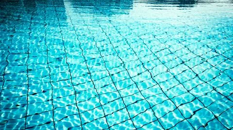 Water background texture. Blue wave pool surface. Summer sea abstract pattern Foto stock