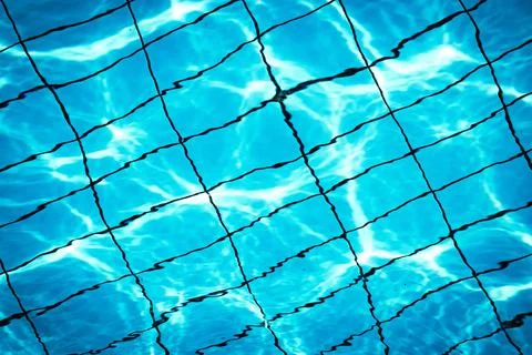 Water background texture. Blue wave pool surface. Summer sea abstract pattern Stock Photos