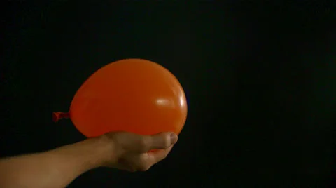 A water balloon exploding. Video stock 51841427