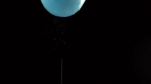Water balloon falling on black background Stock Footage 55629131