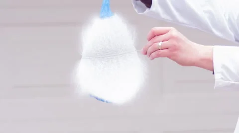 Water balloon popped using needle slow motion Stock Footage 62248376