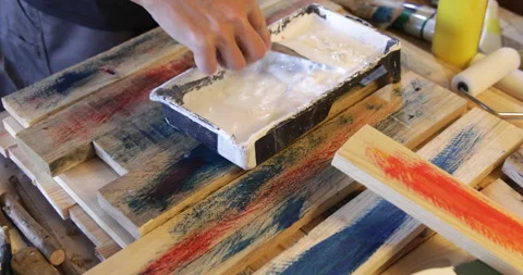 Water based Acrylic paint diluted in plastic pote paint thiner 4K Stock Footage 328988942