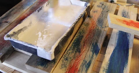 Water based Acrylic paint diluted in plastic pot Stock Footage 328988943