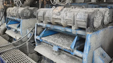 Water-Based Mud Sweep Over Shale Shakers at Shaker House Area Stock Footage 337800832