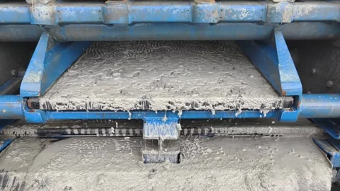 Water-Based Mud Sweep Over Shale Shakers at Shaker House Area Stock Footage 337800833