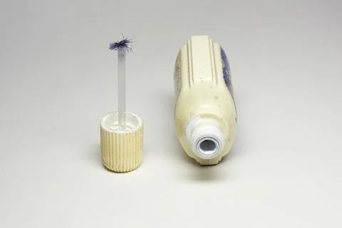 Water-based white text correction fluid. old open plastic bottle at its rib.. Stock Photos