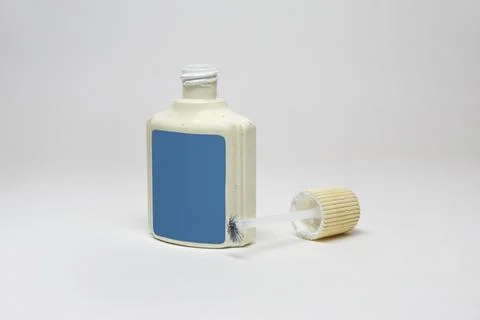 Water-based white text correction fluid. open plastic bottle with blank lab.. Stock Photos