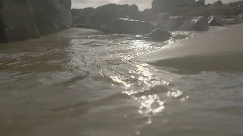 Water on the beach at sunrise Stock Footage 74069909