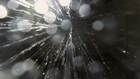 Water beautifully drips onto the camera Stock Footage 142123105