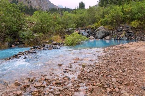 Water Beginning River Mountains Spring Stock Photos