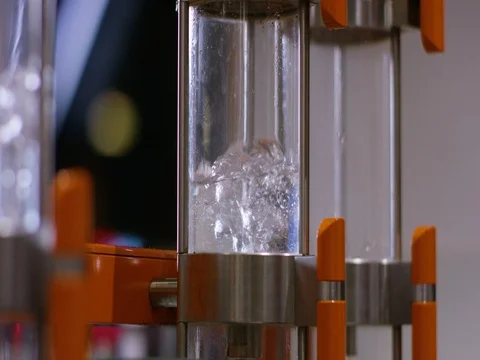 Water being boiled in machine at laboratory 库存影片 83303877