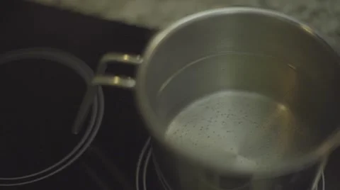 Water being boiled in pan Stock Footage 55571351