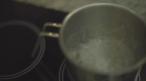 Water being boiled in pan Stock Footage 55571357