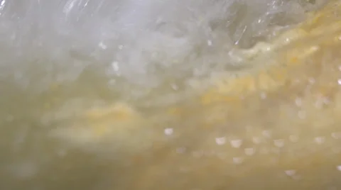 Water Being Poured Into a Batch of Mustard HD Video Video stock 25938761